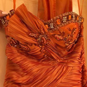 Strapless orange evening gown